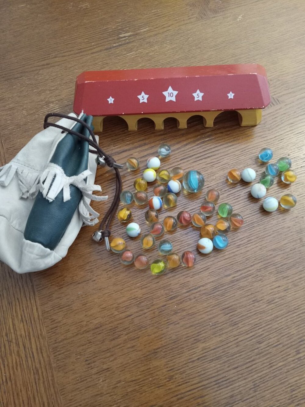 Vintage Marbles, a Leather Pouch and A Marble Inn